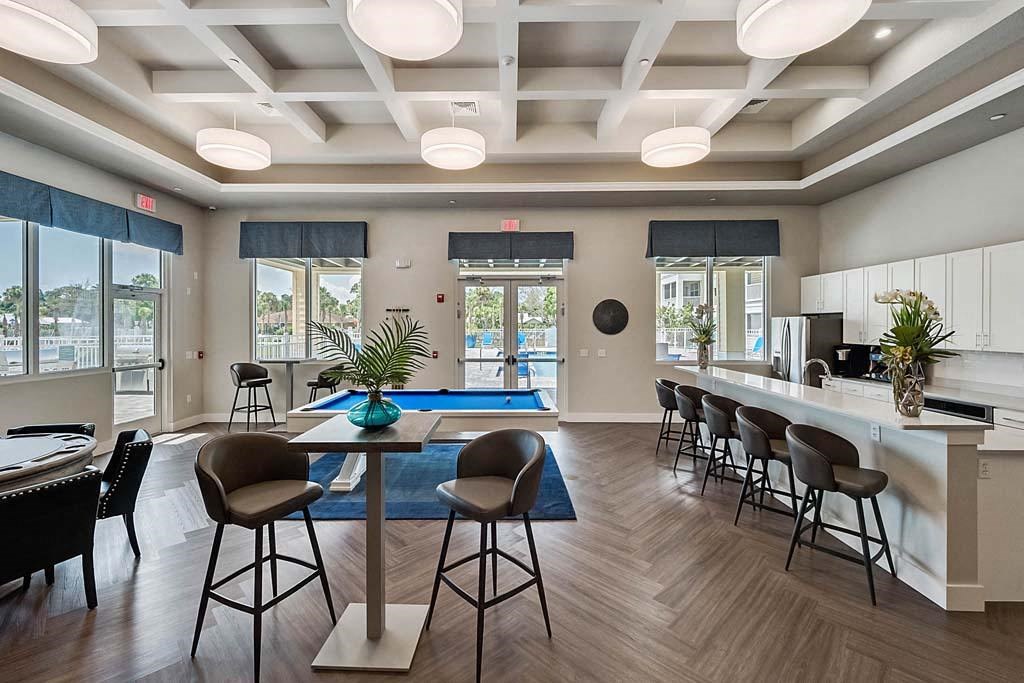 Eat-In Table With High Chairs In Clubhouse at Waterline Bonita Springs, Bonita Springs, Florida