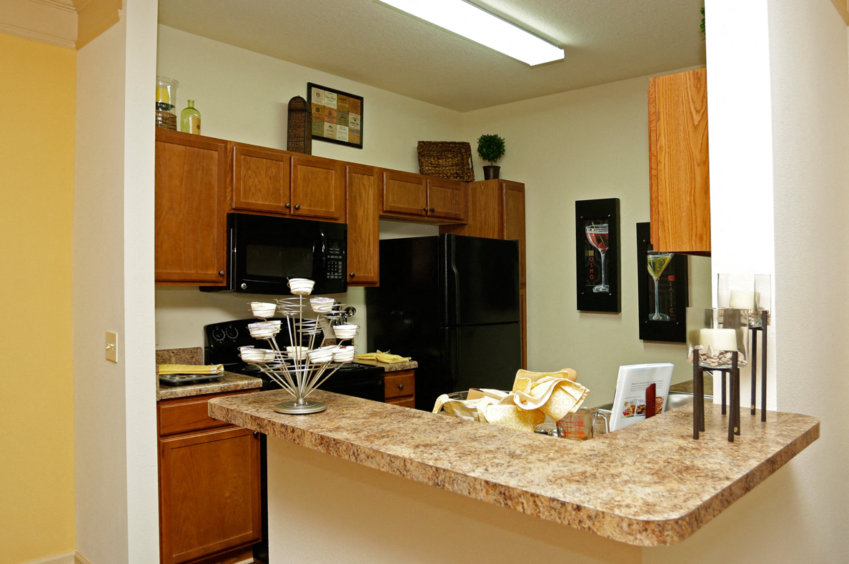 Kitchen view from dining room at Houma Highlands, Houma, LA, 70360