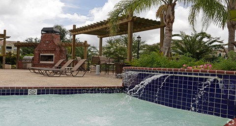 Beautiful pool with fountain and pergola view at Houma Highlands, Houma, LA, 70360