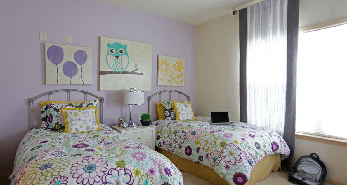 Spacious guest bedroom with walk in closet at Houma Highlands, Houma, Louisiana