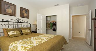 Guest bedroom with ample closet space at The Columns at Bear Creek, New Port Richey, Florida 34654 - Photo Gallery 3