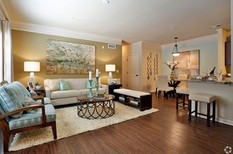 Modern living room with 9 foot ceilings at The Columns at Coldbrook Station, 31407 - Photo Gallery 5