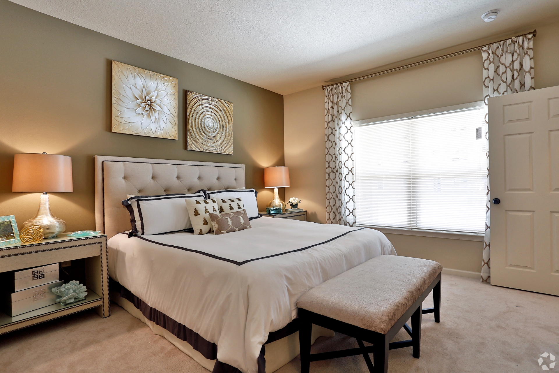 Airy main bedroom with modern décor at The Columns at Coldbrook Station, GA