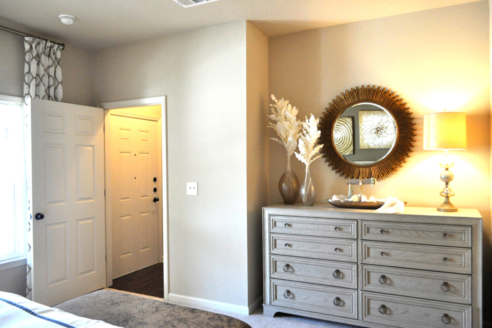 Entry to main bedroom with large dresser at The Columns at Coldbrook Station, Georgia 31407