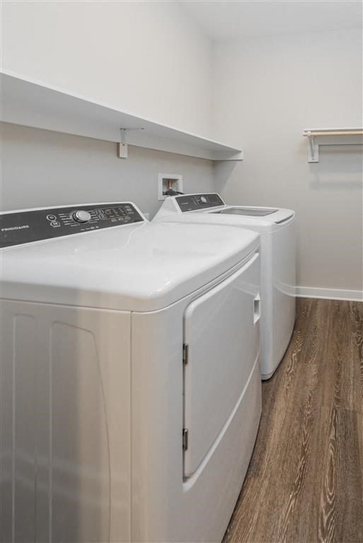 a white washer and dryer in a room at Verso Apartments, Davenport, 33896