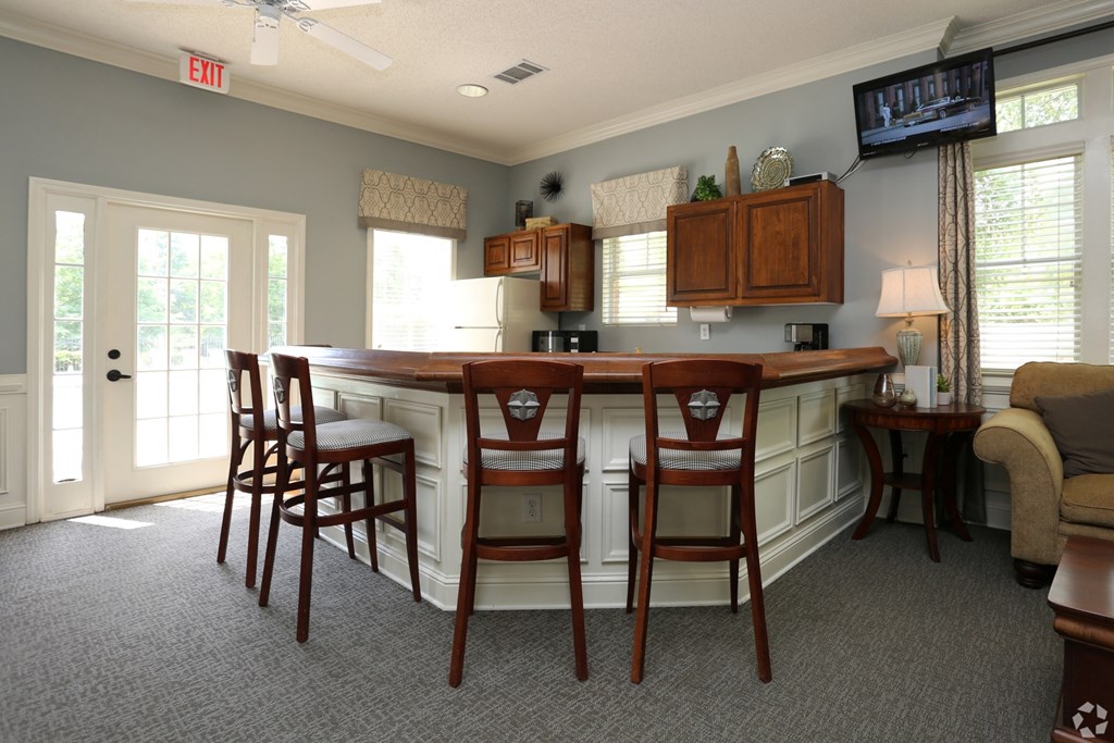 Clubhouse kitchen with bar seating at The Columns at Hiram, 30141