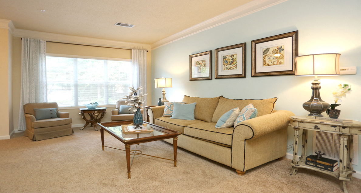 Spacious living room with large windows at The Columns at Hiram, 6736 Bill Carruth Parkway, Hiram, Georgia