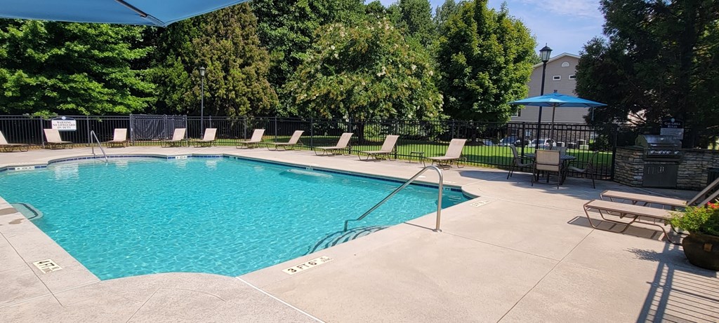 Luxurious resort style swimming pool at The Columns at Oakwood, 2102 Education Way, Oakwood, Georgia 30566