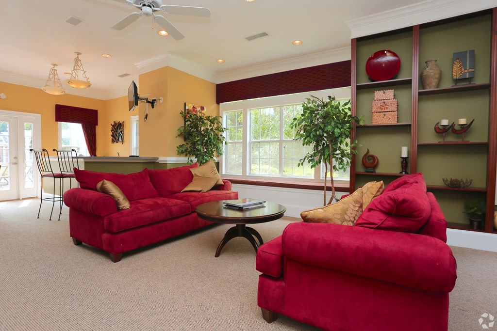 Community clubhouse lounge area at The Columns at Paxton Lane, 30047