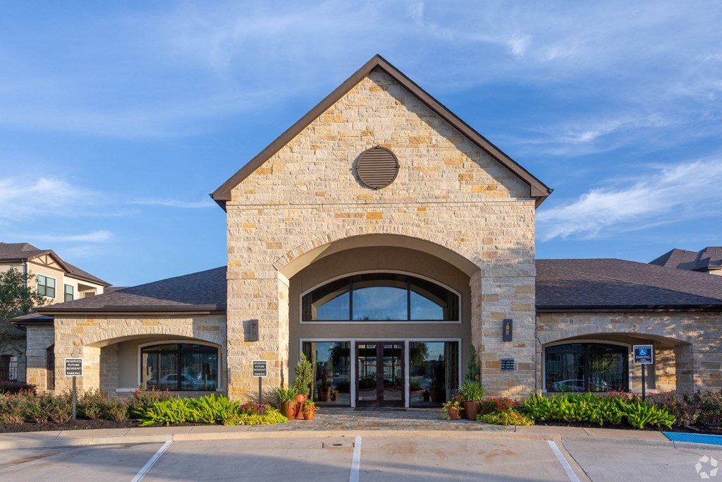 Beautiful leasing office exterior with stacked stone, The Columns at Shadow Creek Ranch, Pearland