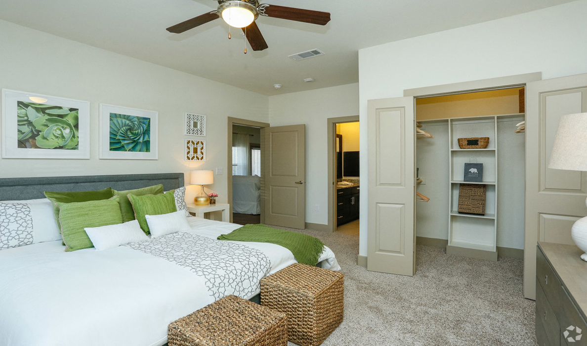 Bright bedroom with modern décor and ceiling fan, The Columns at Shadow Creek Ranch, 12325 Shadow Creek Parkway, 77584
