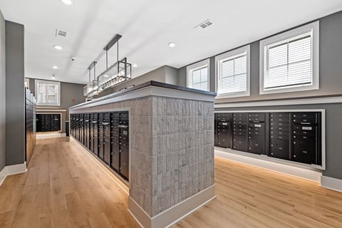 the wine room has a large selection of wine racks and a wood floor