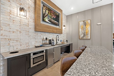 a kitchen with a counter top and a sink