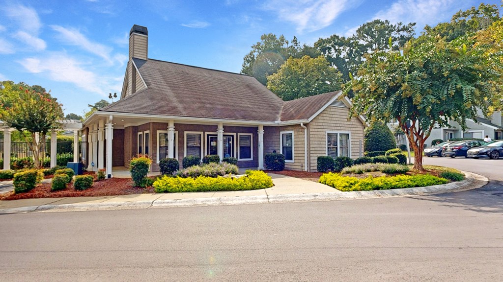 a house with a tree in front of it