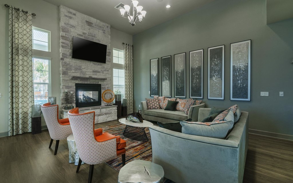 a living room with gray walls and a fireplace
