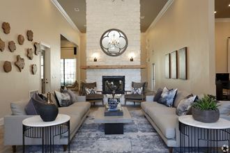 Spacious clubhouse lobby with seating at The Columns at Westchase, Houston, TX 77042