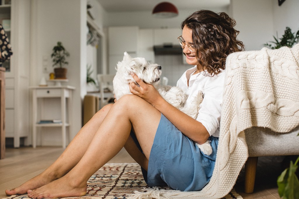 Woman with pet dog at The Corwyn South Point, McDonough