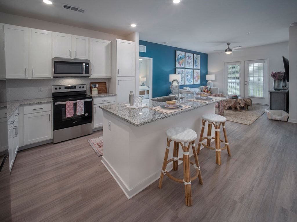 Fitted Kitchen With Island Dining at Makara Orlando, Orlando, FL