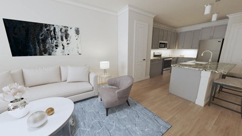 a living room with a couch a table and a chair