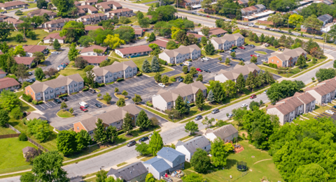 A residential area with houses and trees.