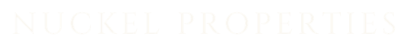 The image displays the words "NUKEL PROPERTIES" in a stylized font.