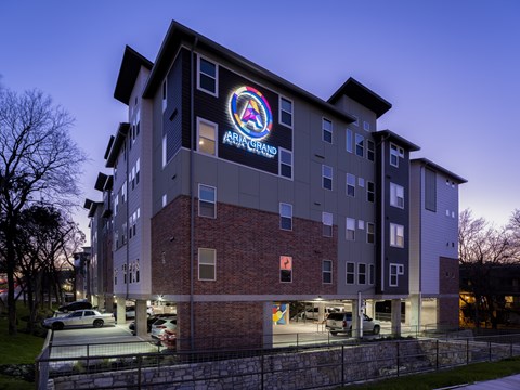 A building with the name "ARBURG" on it.