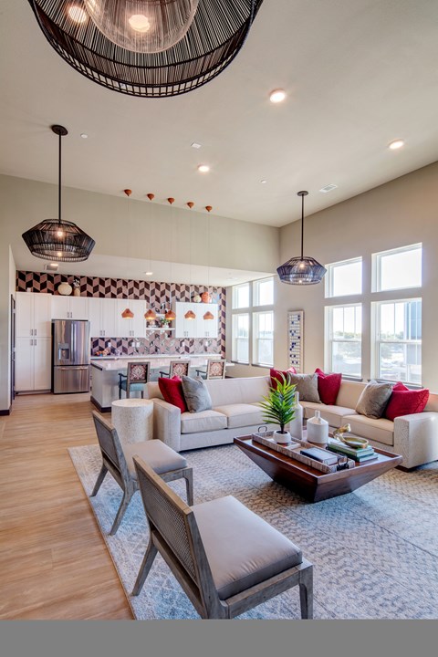 A modern living room with a large sofa and a coffee table.