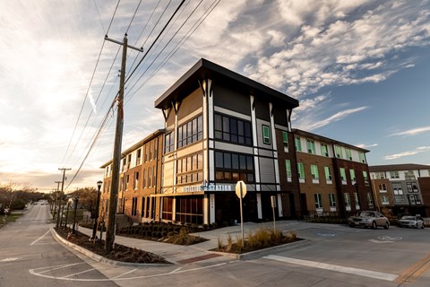 A street view of a building with a sign that reads "The Irish".