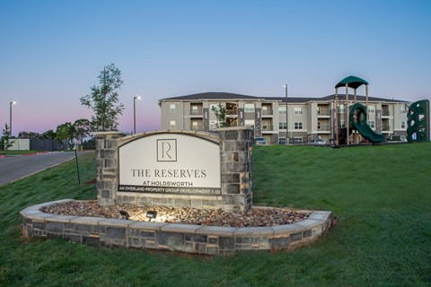 A sign for The Reserves at Holdsworth by Inverness Property Group Development.