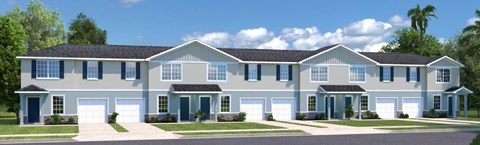 A large, two-story house with a grey and white exterior and multiple garages.