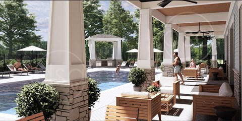 A pool area with a woman walking and several lounge chairs.