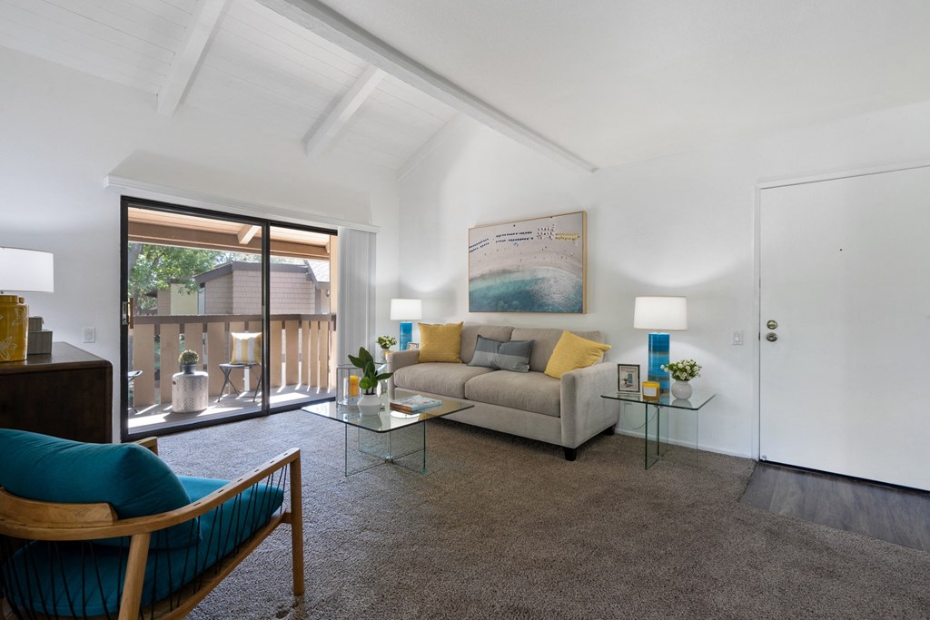 a living room with a couch and a chair