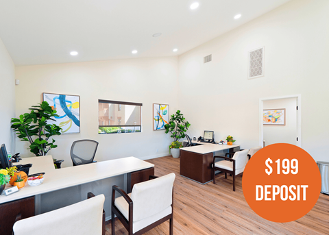 a home office with a desk and chairs and a 99 deposit logo