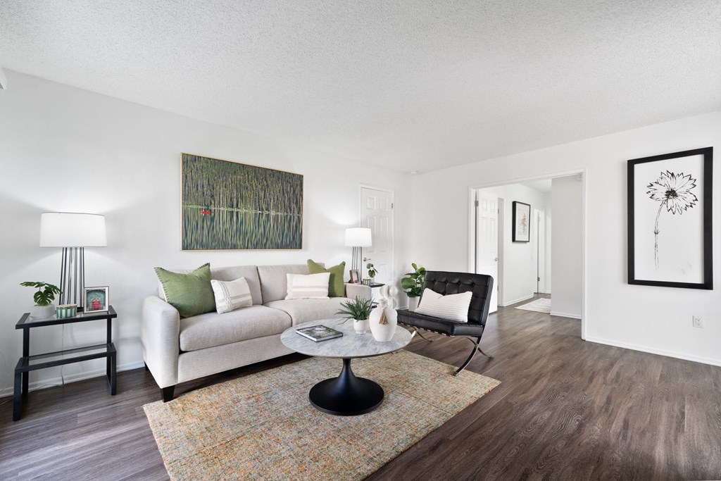 a living room with a couch and a coffee table