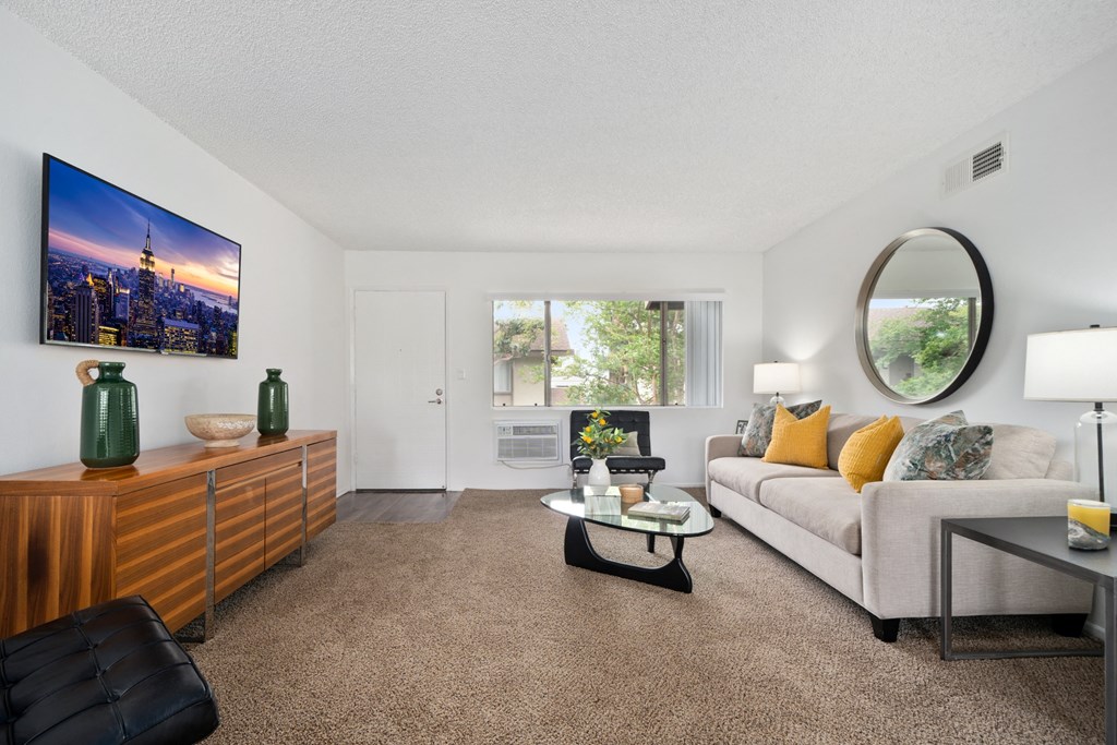 a living room with a couch and a coffee table