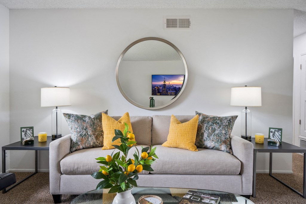 our apartments offer a living room with a sofa and coffee table