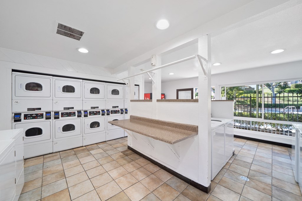 the laundry room is equipped with washes and dryers