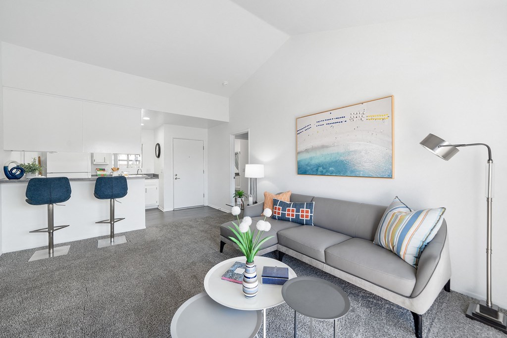 a living room with a couch and a coffee table