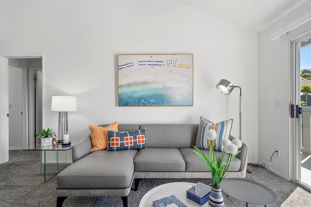 a living room with a couch and a coffee table