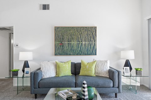 a living room with a couch and a coffee table