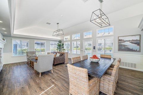 a wall of wine bottles in a room with shelves