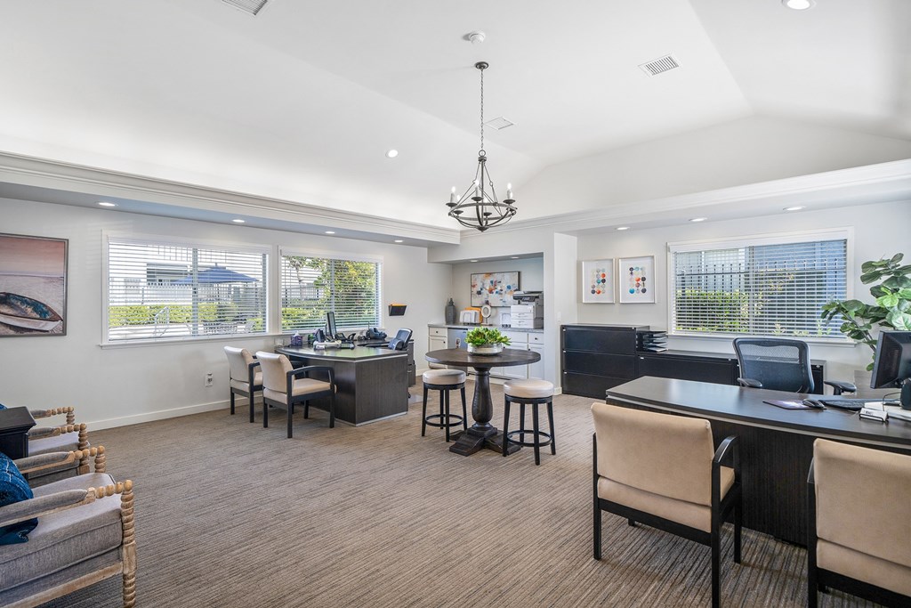 the preserve at ballantyne commons clubhouse with dining area and living room