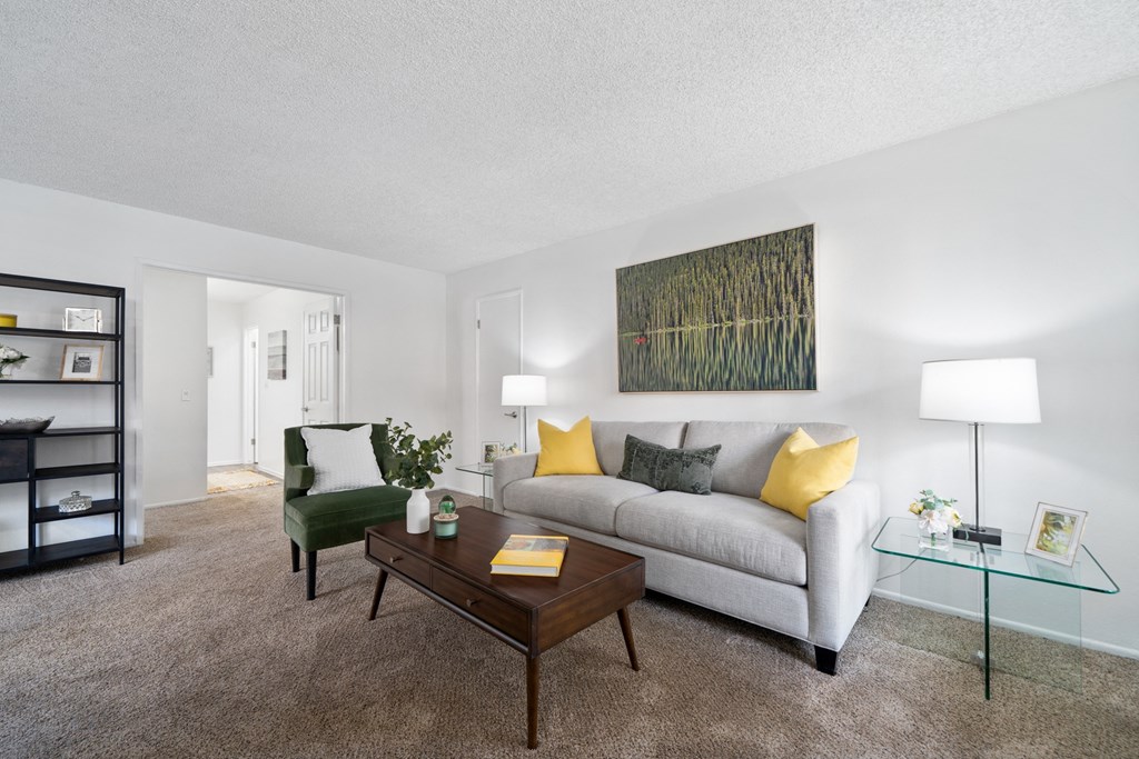 a living room with a couch and a coffee table