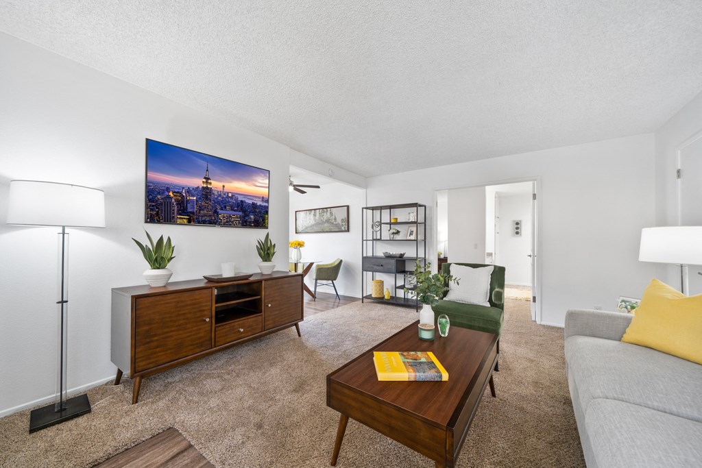 a living room with a couch and a coffee table