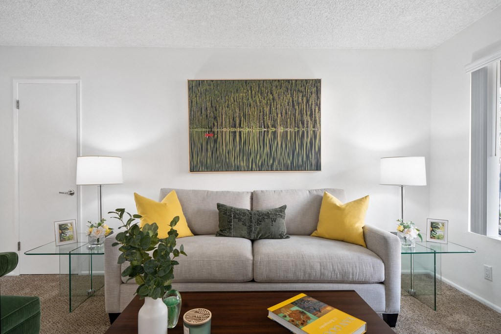 a living room with a couch and a table