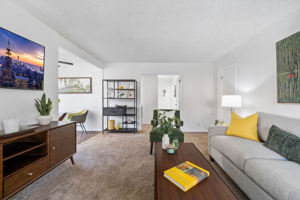 a living room with a couch and a coffee table