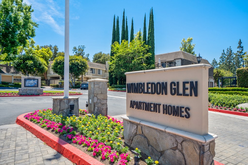 a sign that says wimbledon glen apartments