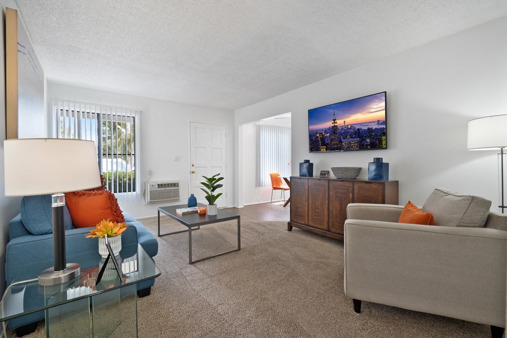 a living room with a couch and a table