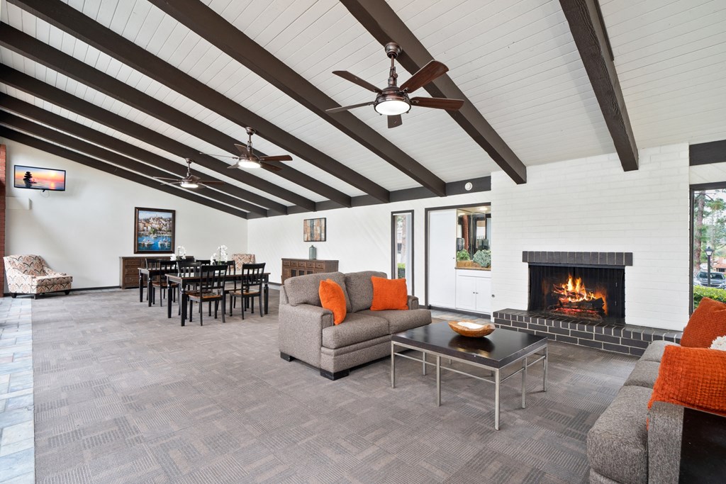 a living room with couches and a fireplace
