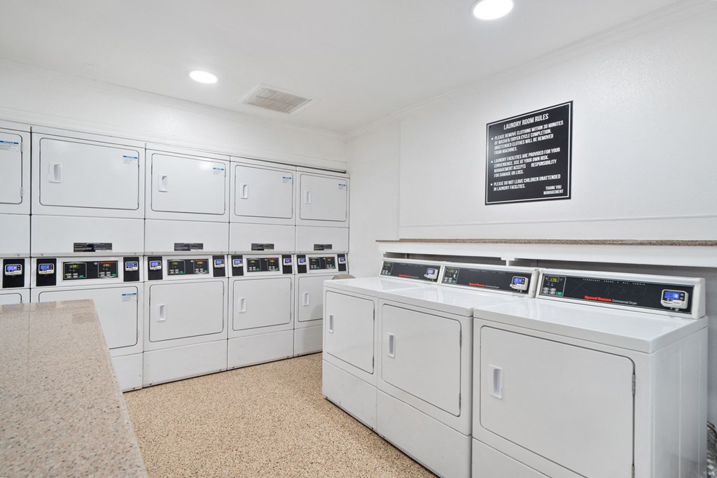 the laundry room is equipped with washes and dryers